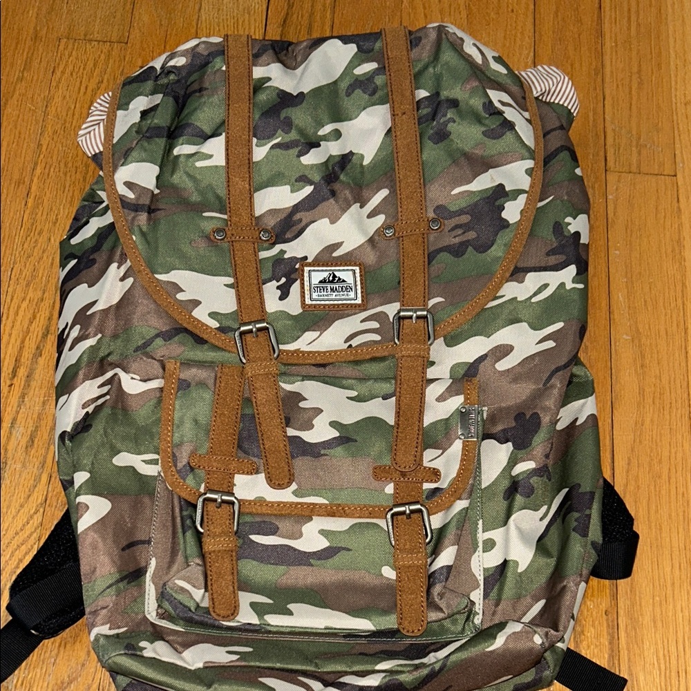 New!!! Never used Steve Madden Camouflage Backpack with Tan Straps.
